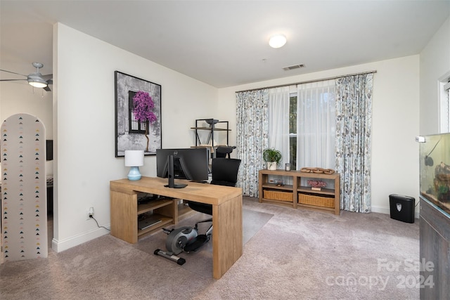 office area with light carpet and ceiling fan