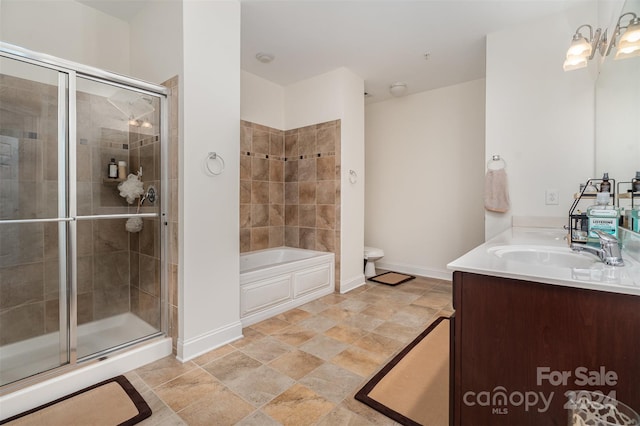 full bathroom with vanity, toilet, a chandelier, and separate shower and tub