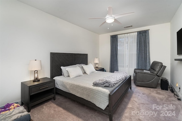 bedroom with light colored carpet and ceiling fan