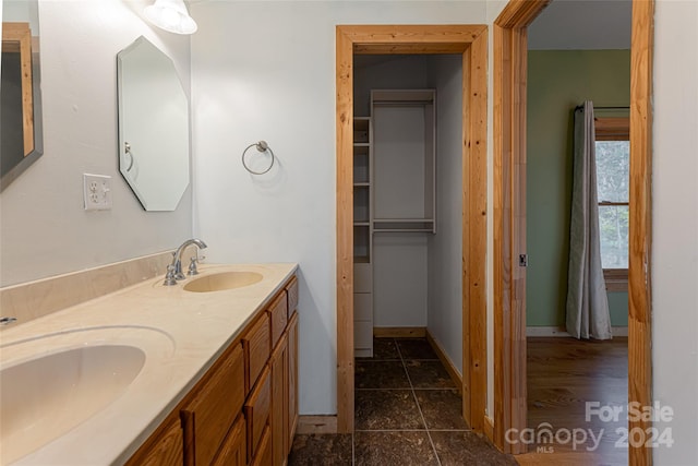 bathroom with vanity and tile patterned floors