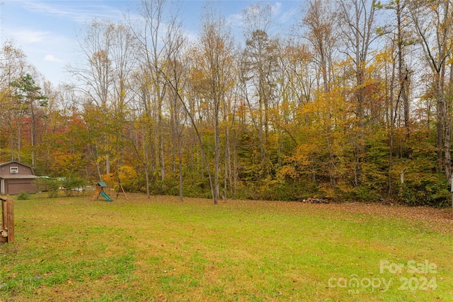 view of yard featuring a playground