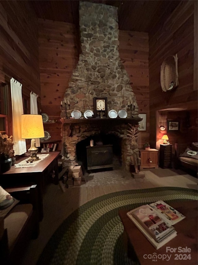 living room featuring wood walls