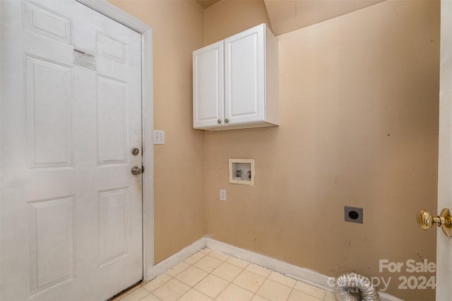 clothes washing area featuring hookup for an electric dryer, cabinets, and hookup for a washing machine