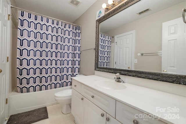 full bathroom featuring shower / bath combination with curtain, vanity, and toilet