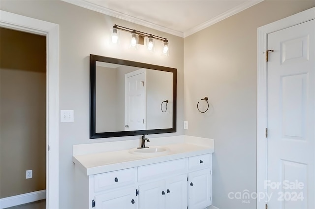 bathroom featuring vanity and ornamental molding