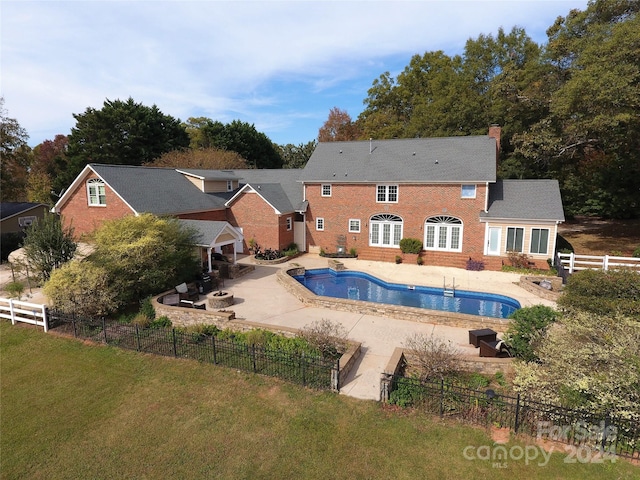 view of pool featuring a patio area