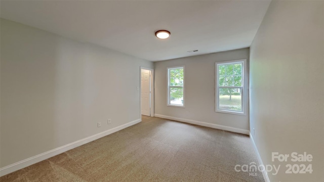 view of carpeted spare room