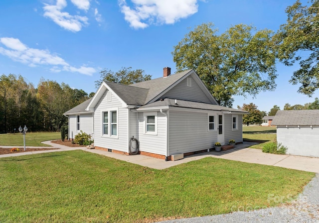 view of property exterior featuring a lawn