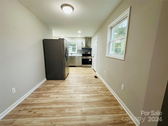 hall featuring light hardwood / wood-style flooring