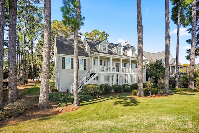 view of front of home featuring a porch and a front yard