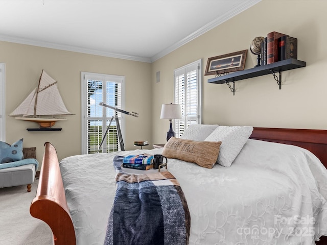 bedroom featuring carpet and crown molding