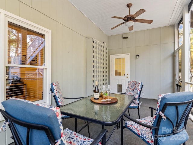 sunroom / solarium with ceiling fan