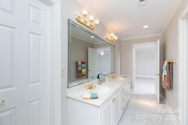 bathroom featuring vanity and crown molding