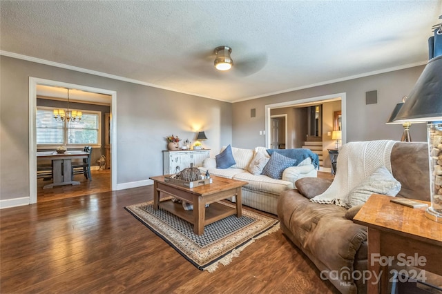 living room with ornamental molding, a textured ceiling, and dark wood-type flooring