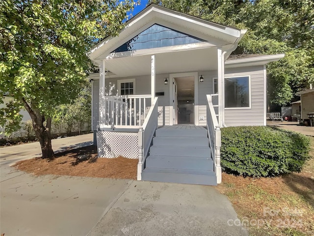 bungalow-style home featuring a porch