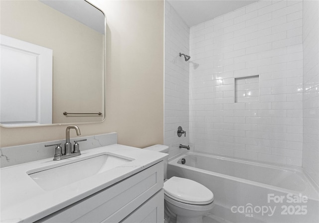 full bathroom with shower / bathing tub combination, vanity, and toilet