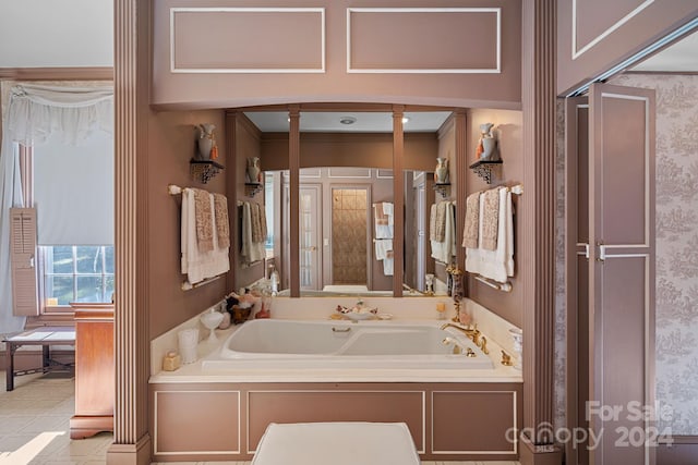 bathroom with tiled tub