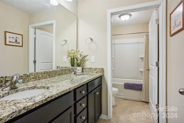 full bathroom featuring tile patterned flooring, vanity, toilet, and shower / bathtub combination with curtain