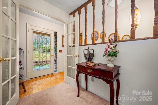 entryway featuring french doors