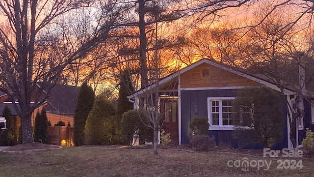 view of property exterior at dusk