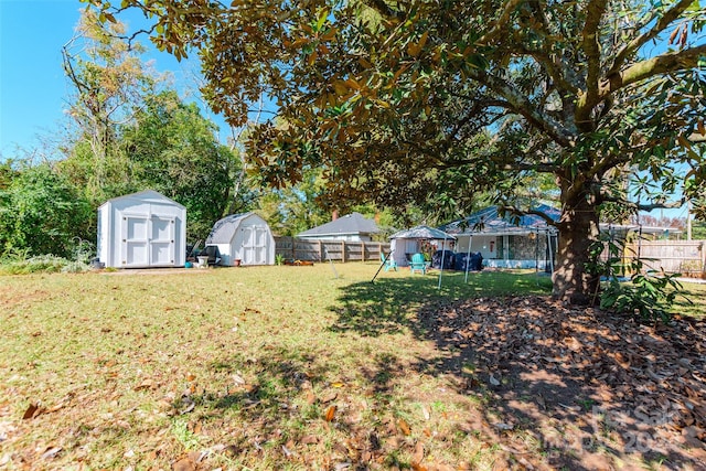 view of yard with a storage unit