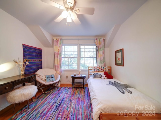 bedroom featuring wood-type flooring, ceiling fan, and lofted ceiling