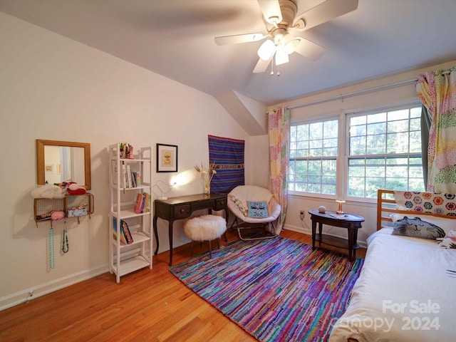 bedroom featuring lofted ceiling, hardwood / wood-style floors, and ceiling fan