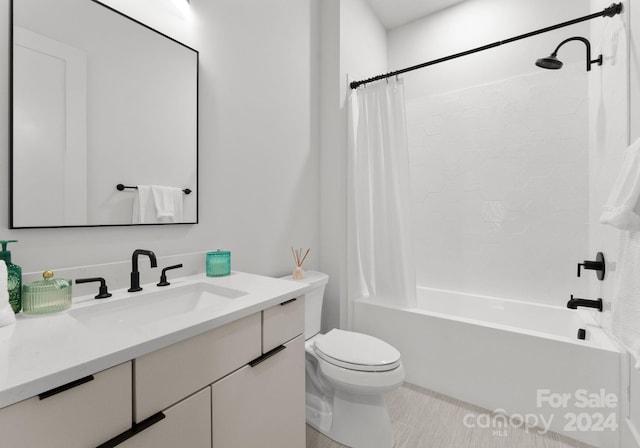 full bathroom featuring vanity, toilet, and shower / bathtub combination with curtain