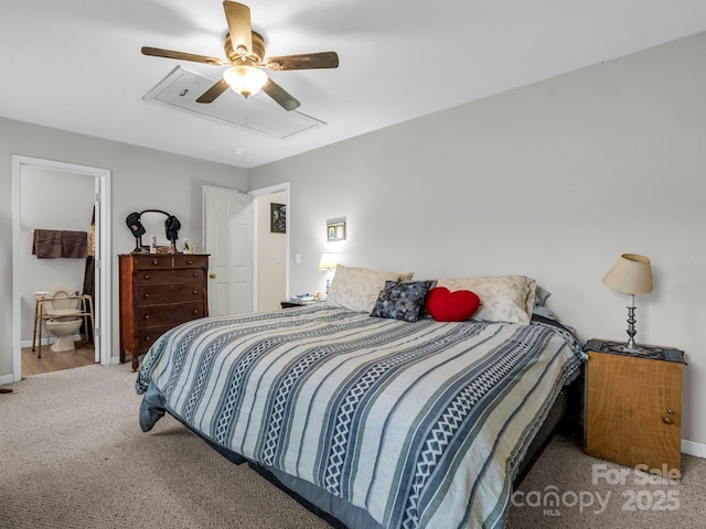 bedroom with carpet flooring, ceiling fan, and connected bathroom