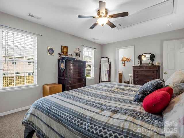 bedroom featuring ceiling fan and carpet