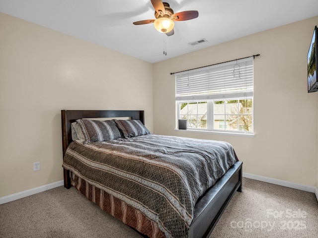 carpeted bedroom featuring ceiling fan