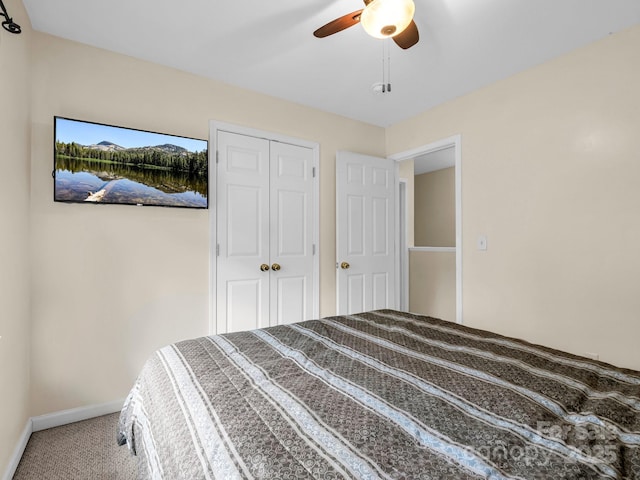 unfurnished bedroom with ceiling fan and carpet