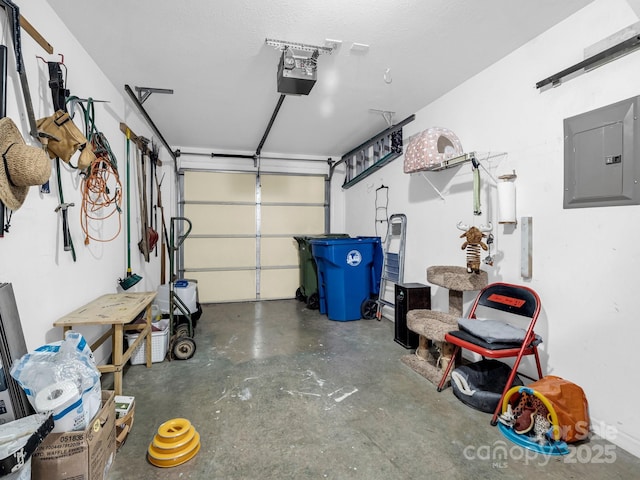 garage with electric panel and a garage door opener