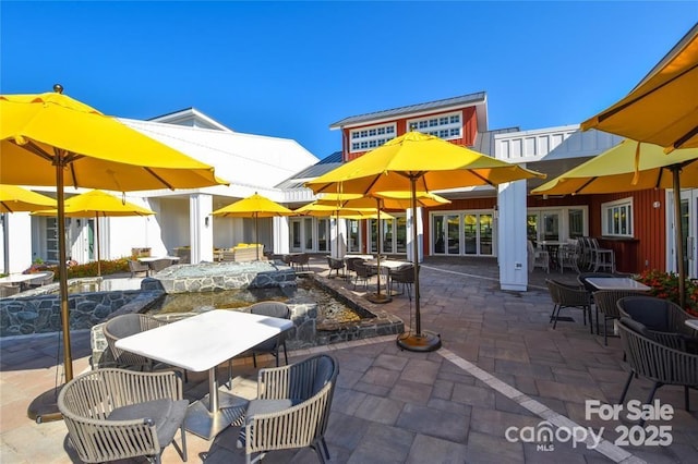 view of patio featuring outdoor dining space