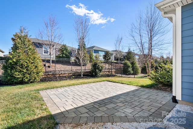 view of patio / terrace featuring fence