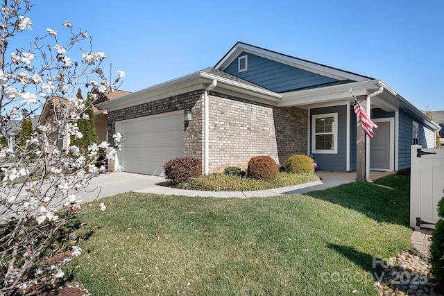 view of property exterior featuring an attached garage, driveway, a lawn, and brick siding