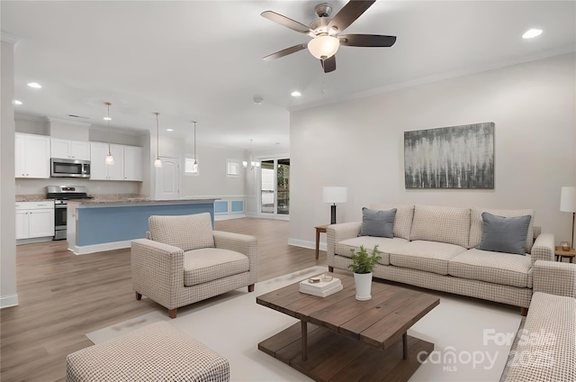 6296 Raven Rock Dr Unit 725, Denver, NC 28037 - living room featuring recessed lighting, a ceiling fan, light wood finished floors, ornamental molding, and baseboards