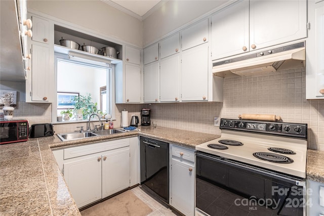 kitchen with white cabinetry, sink, black appliances, and tasteful backsplash