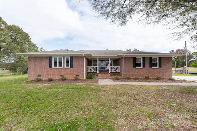 single story home featuring a front yard and covered porch