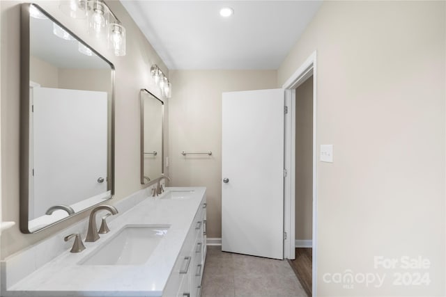 bathroom featuring vanity and tile patterned flooring