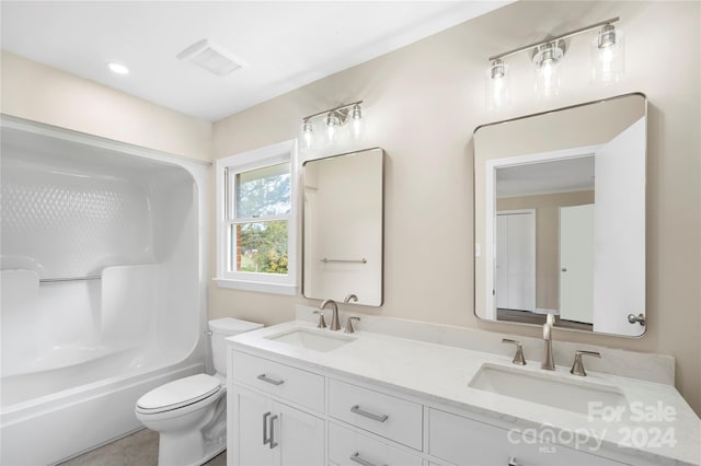 full bathroom featuring vanity, toilet, and shower / tub combination