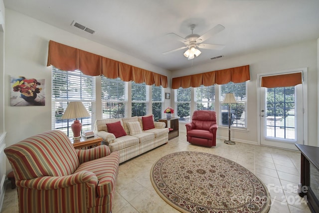 interior space featuring plenty of natural light and ceiling fan