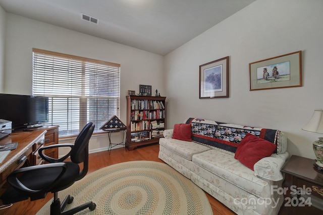 office space with light wood-type flooring