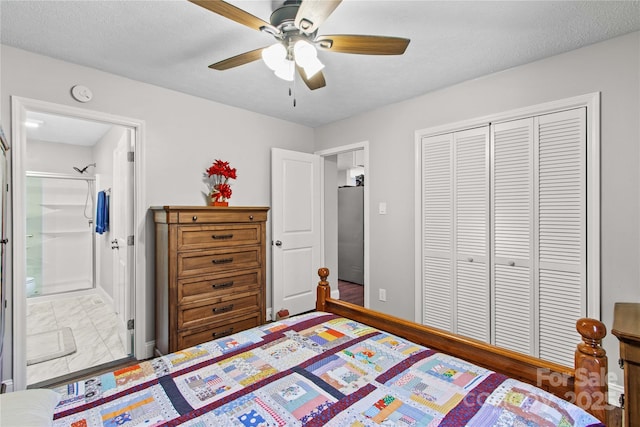 bedroom with a textured ceiling, ceiling fan, connected bathroom, stainless steel refrigerator, and a closet