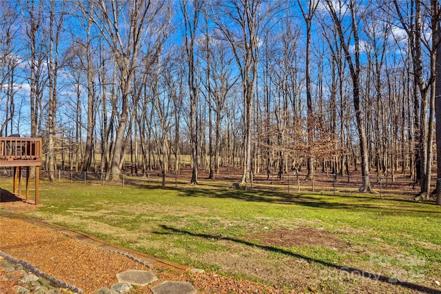 view of yard with a wooden deck