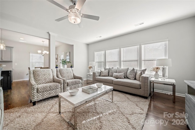 1568 Whitman Ct, York, SC 29745 - living room with a ceiling fan, wood finished floors, and a chandelier