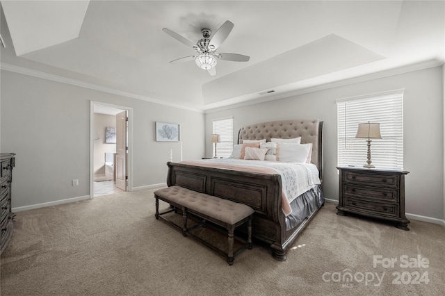 1568 Whitman Ct, York, SC 29745 - bedroom featuring a tray ceiling, carpet, ornamental molding, connected bathroom, and ceiling fan