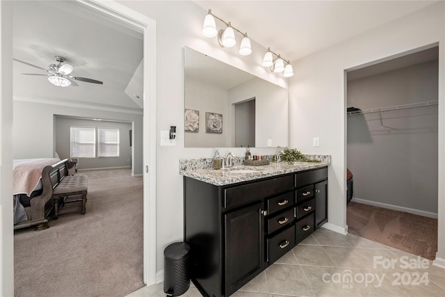 1568 Whitman Ct, York, SC 29745 - full bathroom featuring double vanity, ceiling fan, a walk in closet, and tile patterned floors