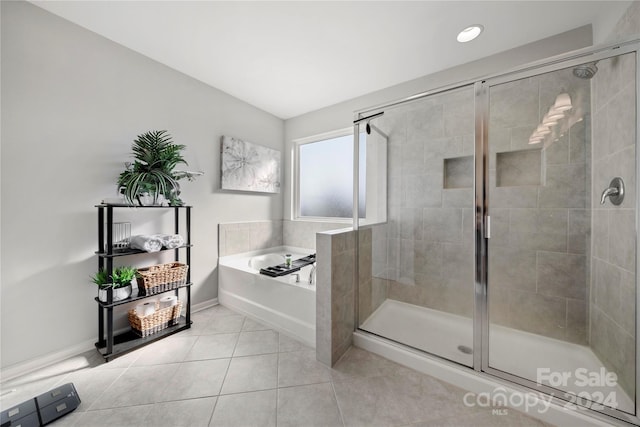 1568 Whitman Ct, York, SC 29745 - bathroom featuring a bath, a shower stall, and tile patterned flooring