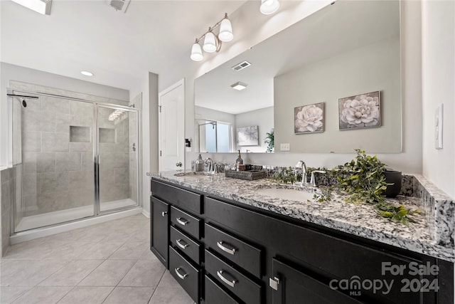 1568 Whitman Ct, York, SC 29745 - full bath featuring double vanity, a shower stall, and tile patterned floors